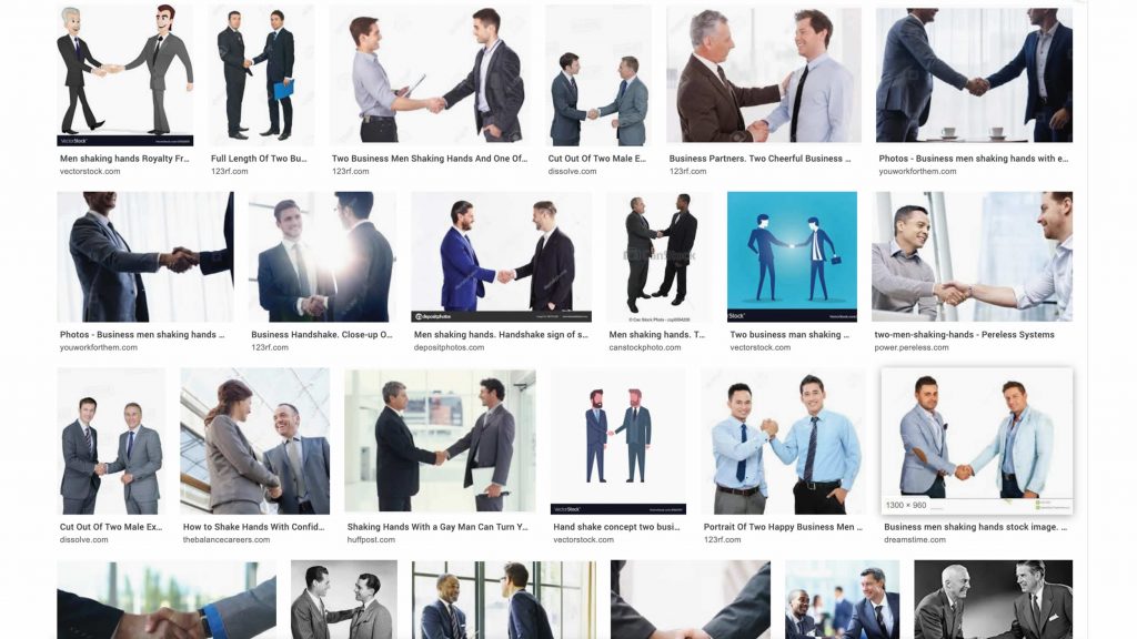 Screenshot van zoekresultaat voor 'Men shaking hands". Resultaat: twee blanke mannen in pak schudden elkaar glimlachend de hand